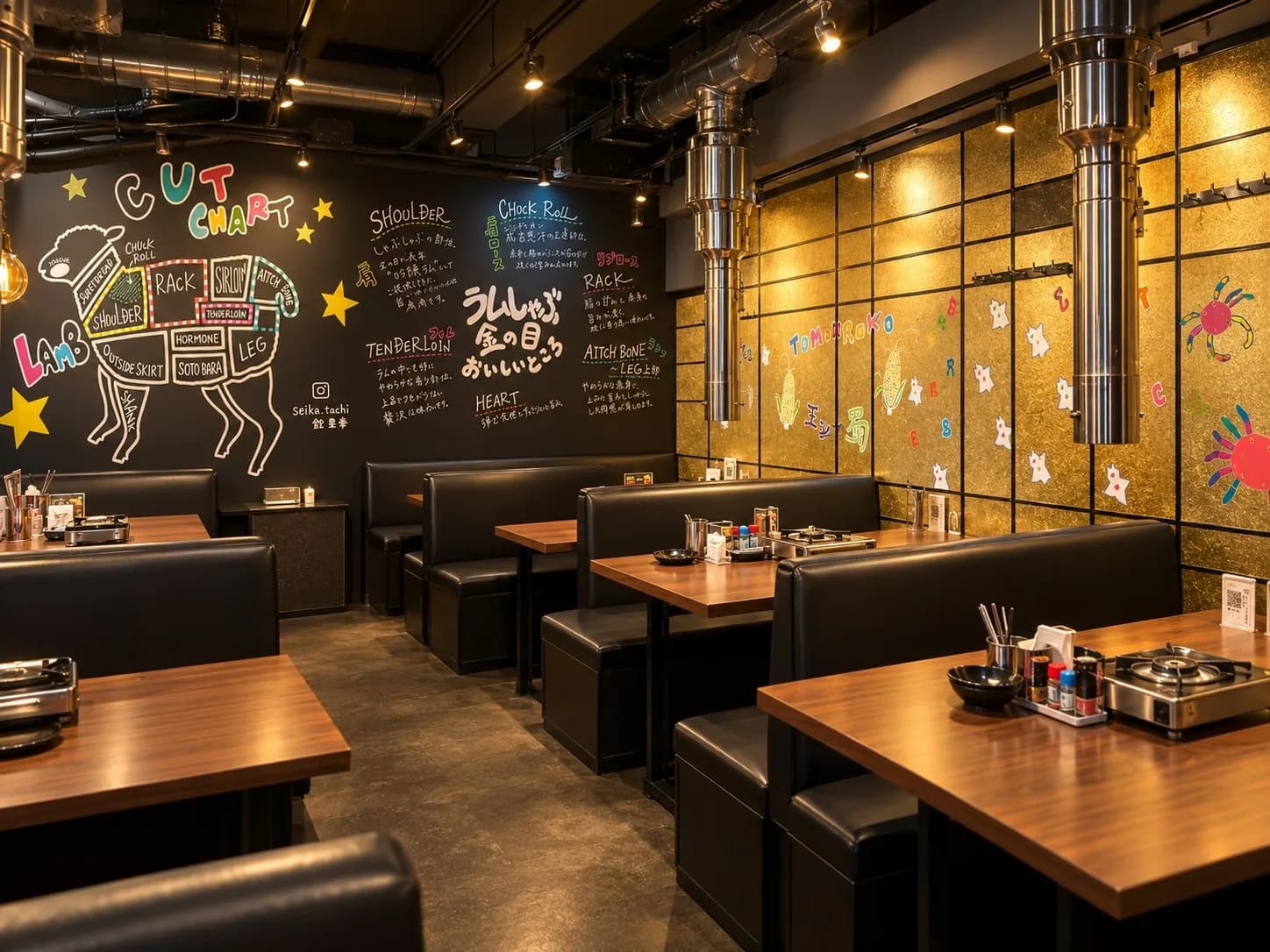 Table seating backed by a neon sign reading Fresh Lamb Genghis Khan Lamb Shabu Kinnome and a logo of a sheep in sunglasses, with two-broth hotpot settings laid out on the wood tabletop.